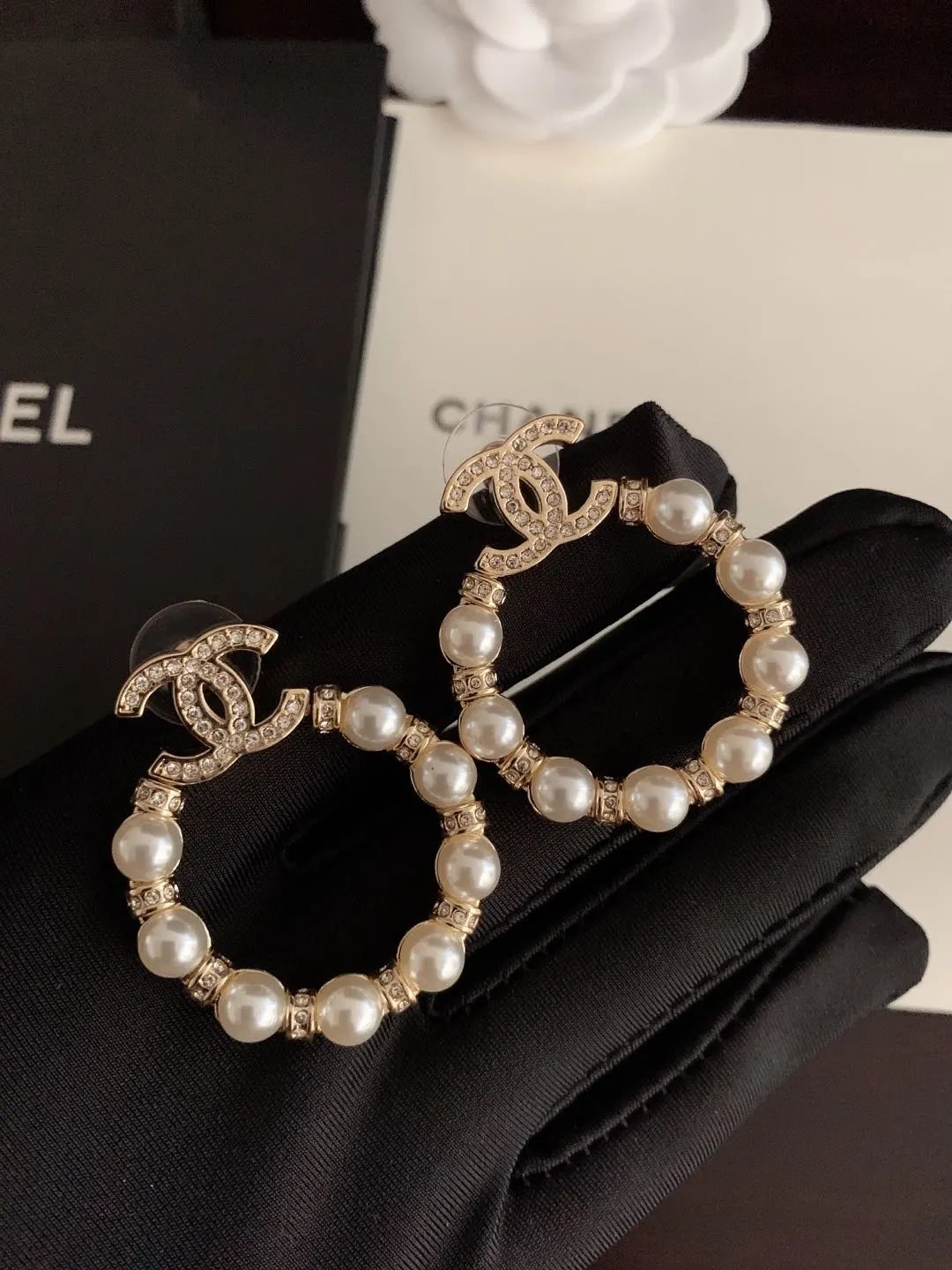 Chanel's latest pearl surround earrings  